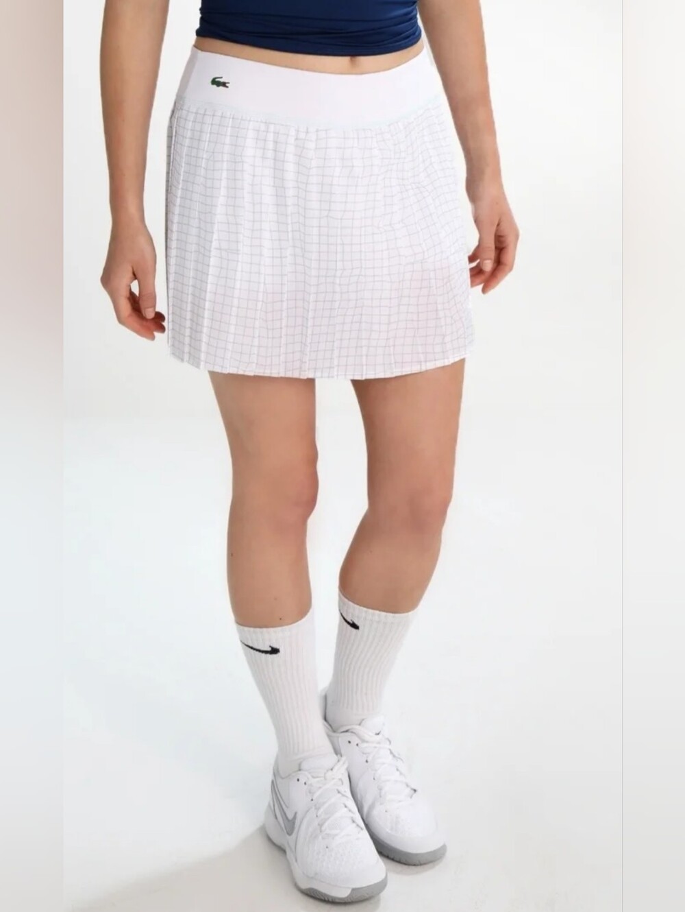 Lacoste Women's Ultra Dry Tennis Heritage Stretch Skirt in White Plaid